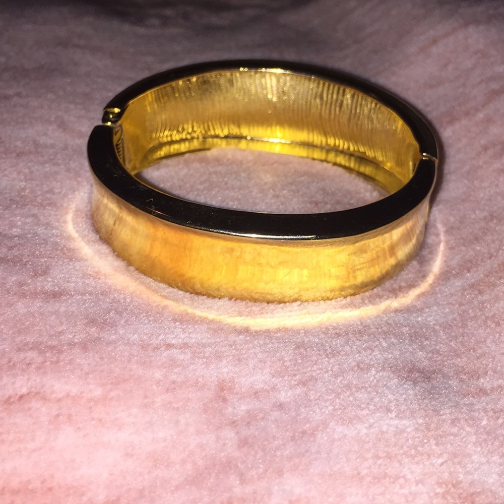 False gold bangle.